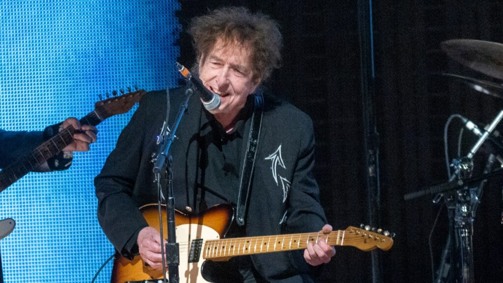 Bob Dylan Employed a New Guitar Participant, however Large Questions Linger