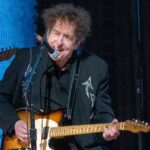 Bob Dylan Employed a New Guitar Participant, however Large Questions Linger