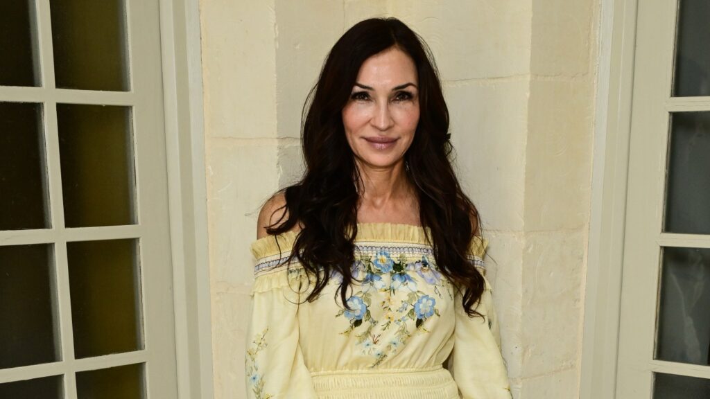 Famke Janssen on Nerve-Wracking Bond Audition, Breaking Ribs Throughout Pierce Brosnan Combat Scene