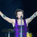 Harry Kinds alarms followers after choking on water and falling onstage throughout UK heatwave