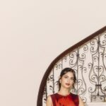 Isha Ambani paired her appliqué midi gown with earrings from her mom’s assortment