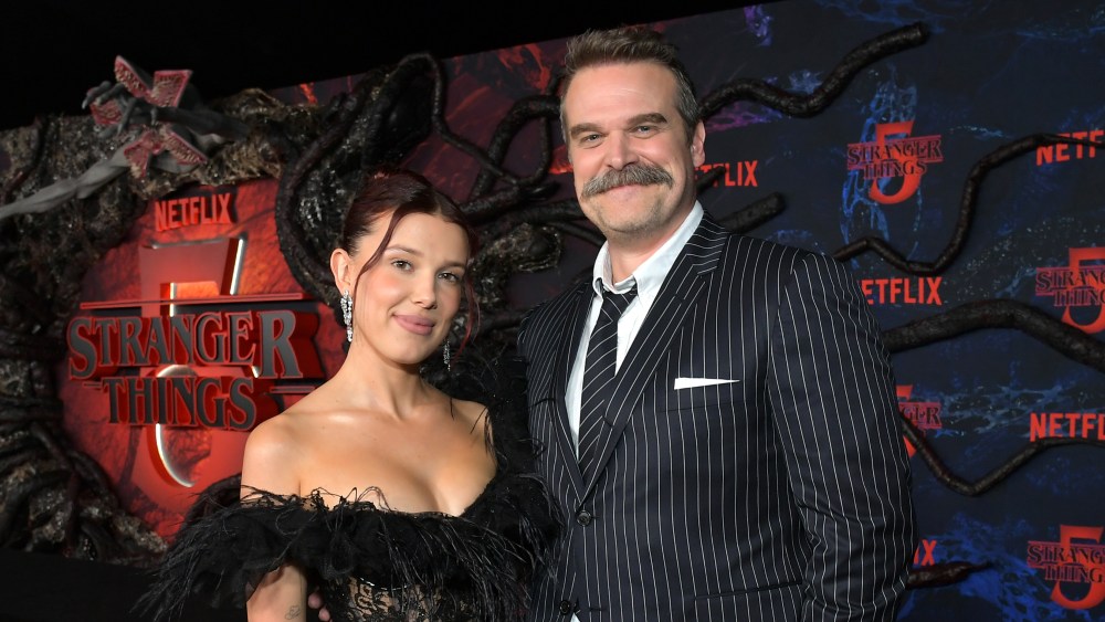 Millie Bobby Brown, David Harbour Reunite After ‘Stranger Issues’ as Father-Daughter Spies in Netflix Sequence From ‘Enola Holmes’ Author Jack Thorne