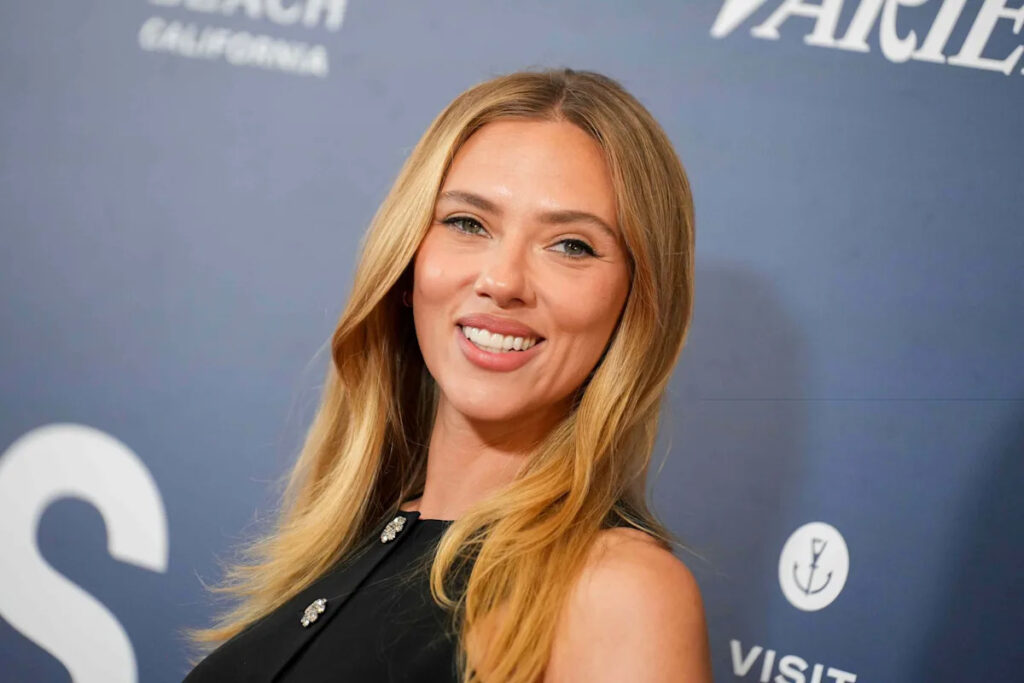 Scarlett Johansson, 41, Stuns in an Ultraviolet Swimsuit Throughout a Make-up-Free Sunbathing Session
