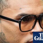 R&B star Chris Brown ordered to pay $13m to housekeeper mauled by his canine